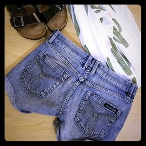 CK denim shortie shorts